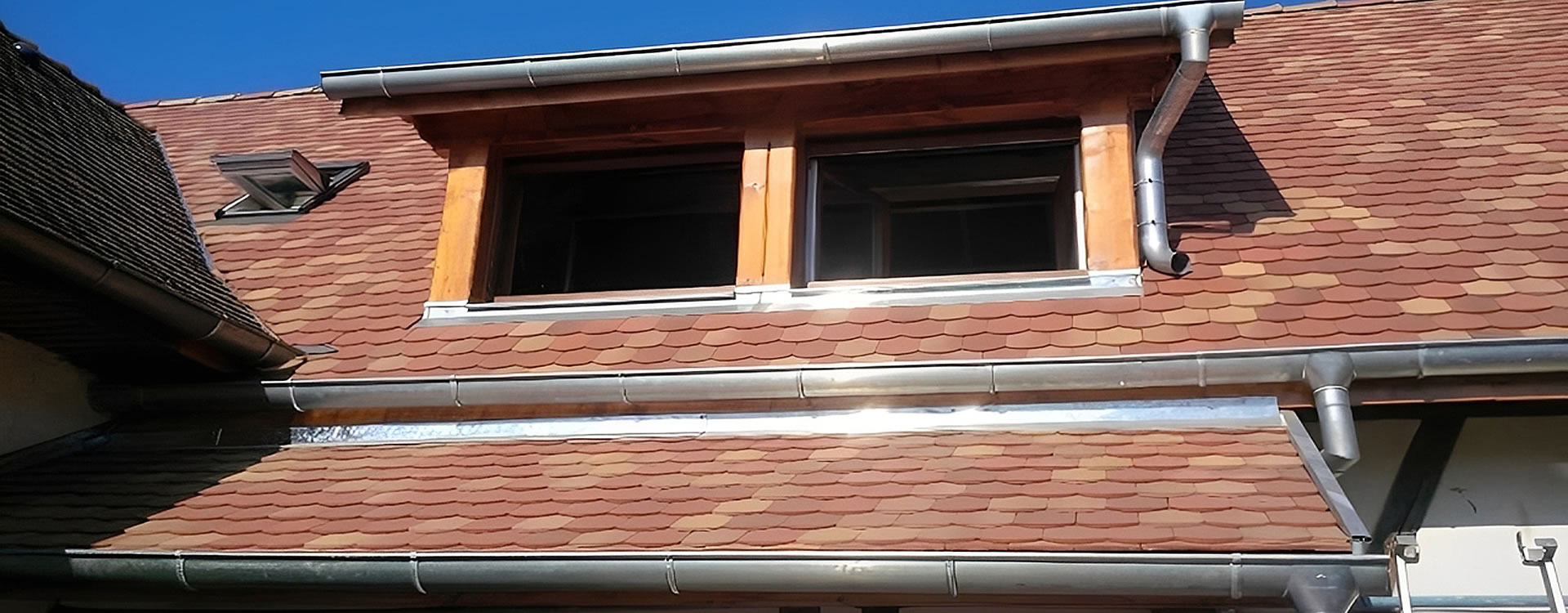 Gouttières en zinc par Macari Couverture